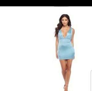 Windsor, deep plunge, Vegas style mini dress.